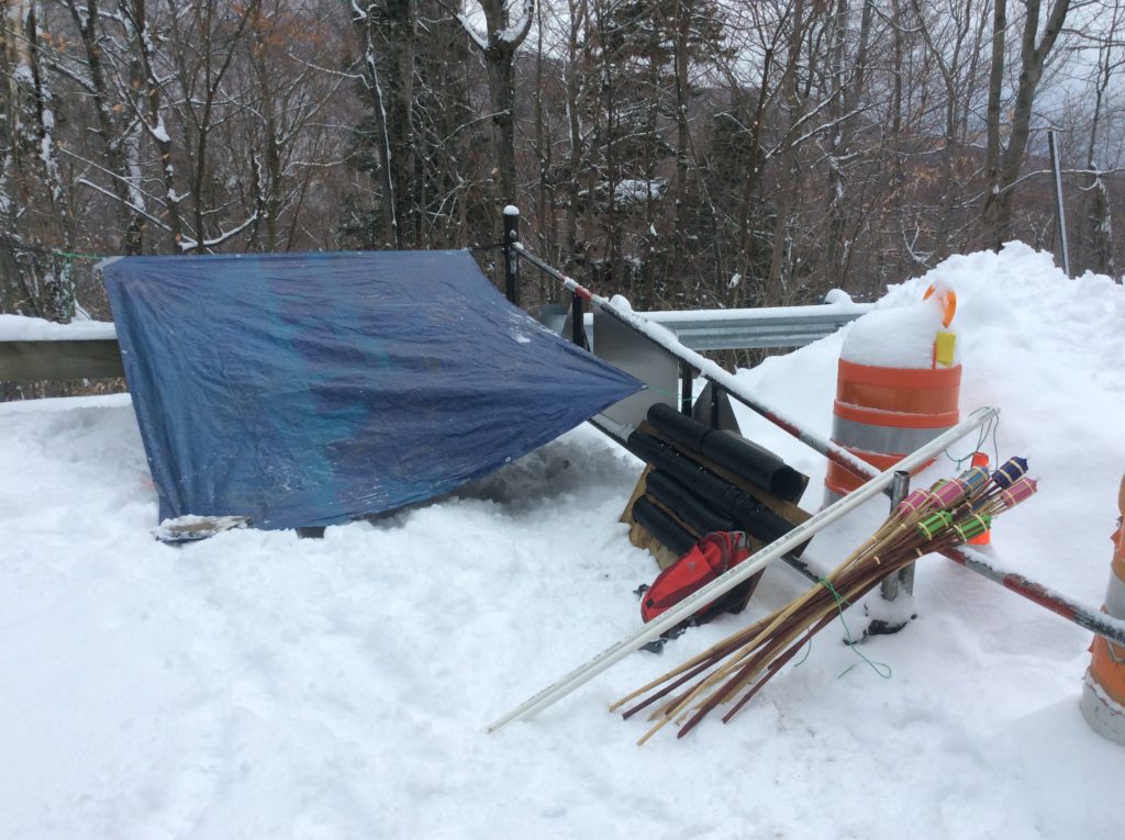 Setting up before practice at the Notch Rd...ski training gear, or hobo shelter? Hmm